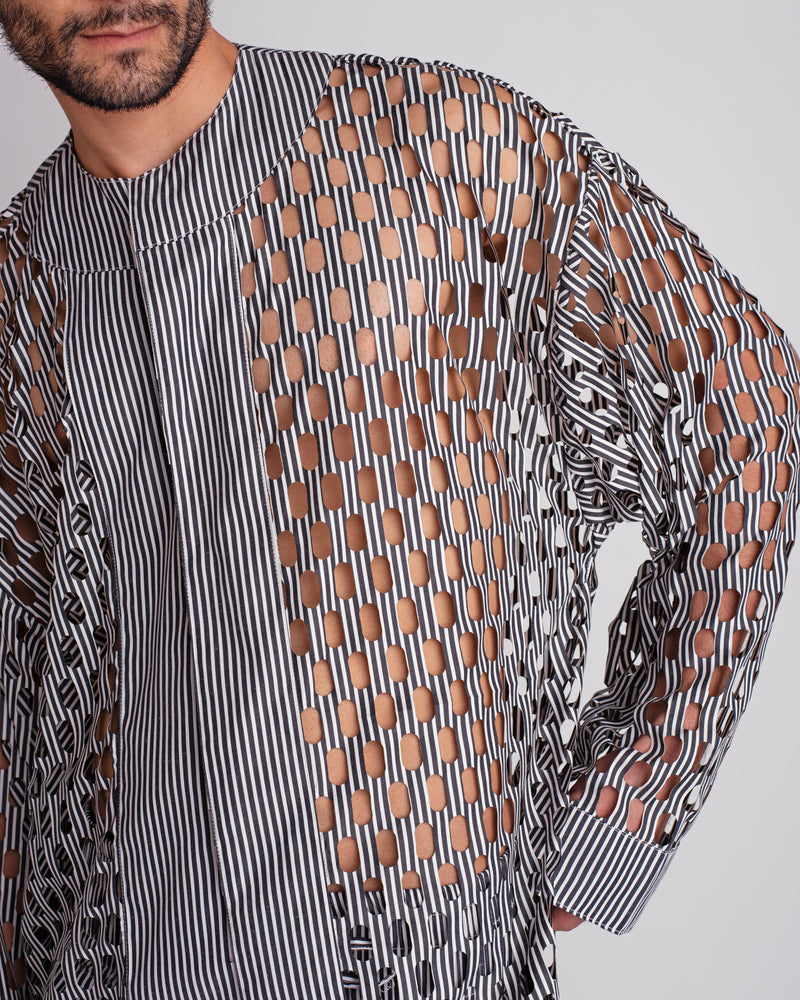 ROSANI The Emerson shirt in black and white stripes. Close-up of custom laser cut-out and press button detail.