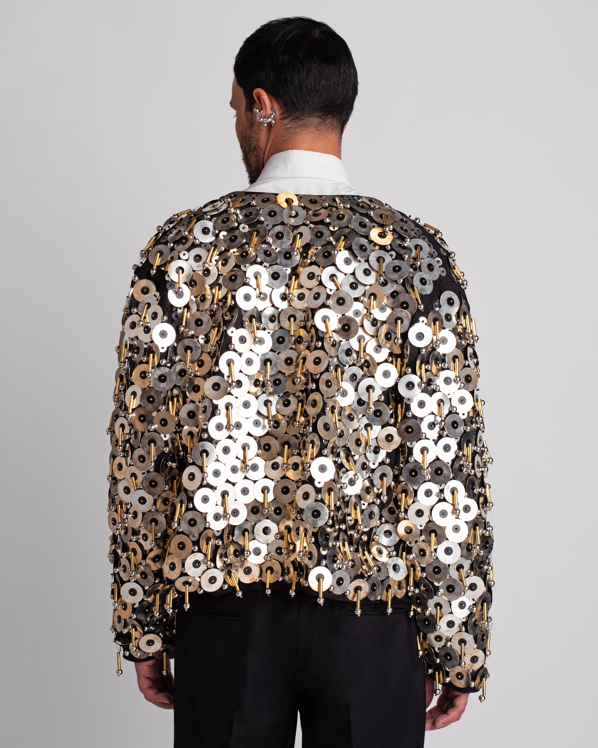 ROSANI The Jase jacket in black - heavy embellished showstopper jacket with metallic discs, beads and tube detailing, back view