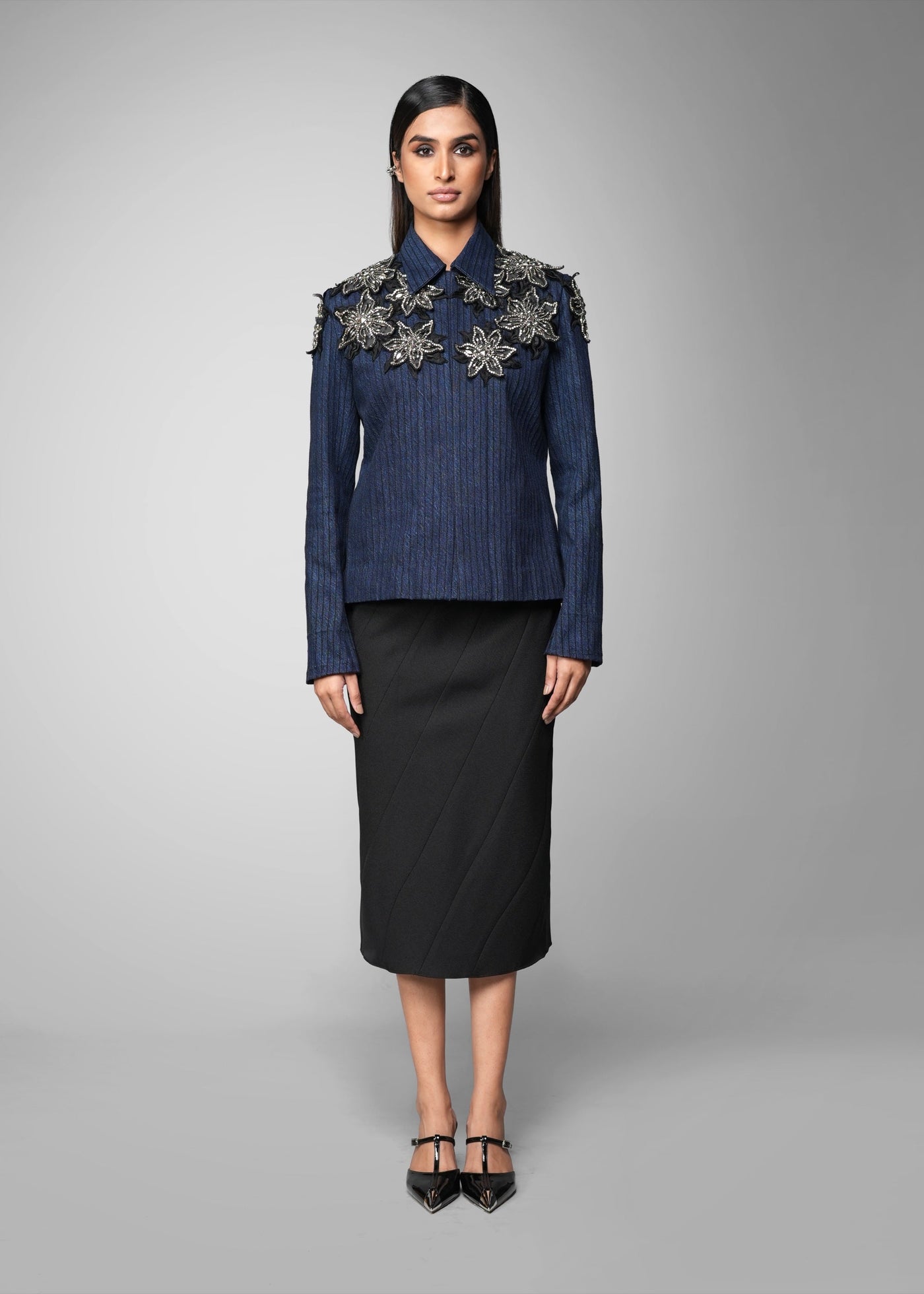 ROSANI The Lero jacket in midnight denim - anchor-stitched denim jacket with metallic floral patches, front view