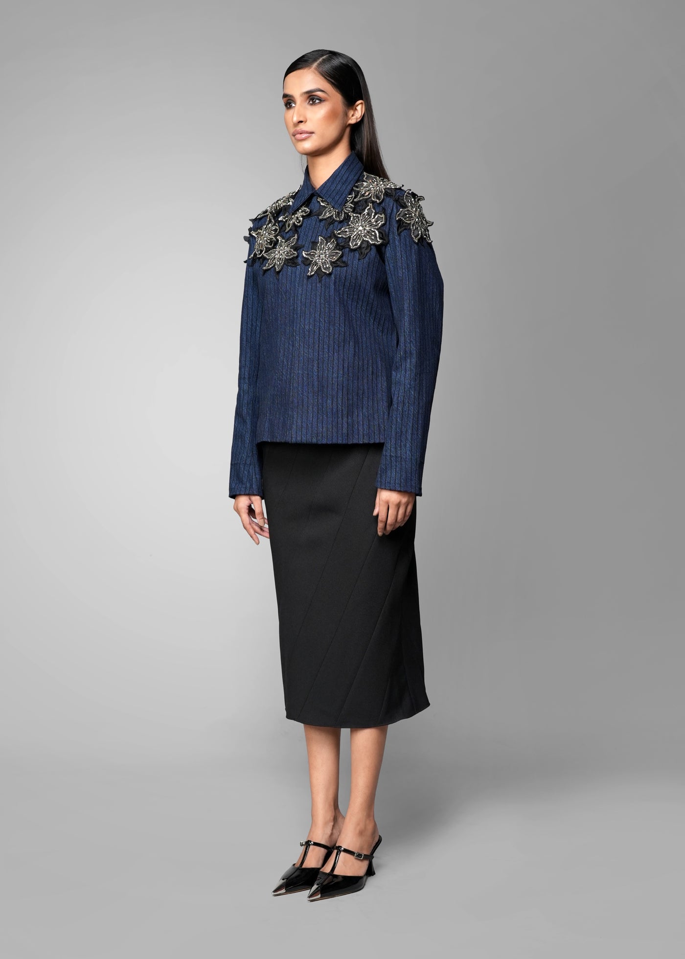 ROSANI The Lero jacket in midnight denim - anchor-stitched denim jacket with metallic floral patches, front side view