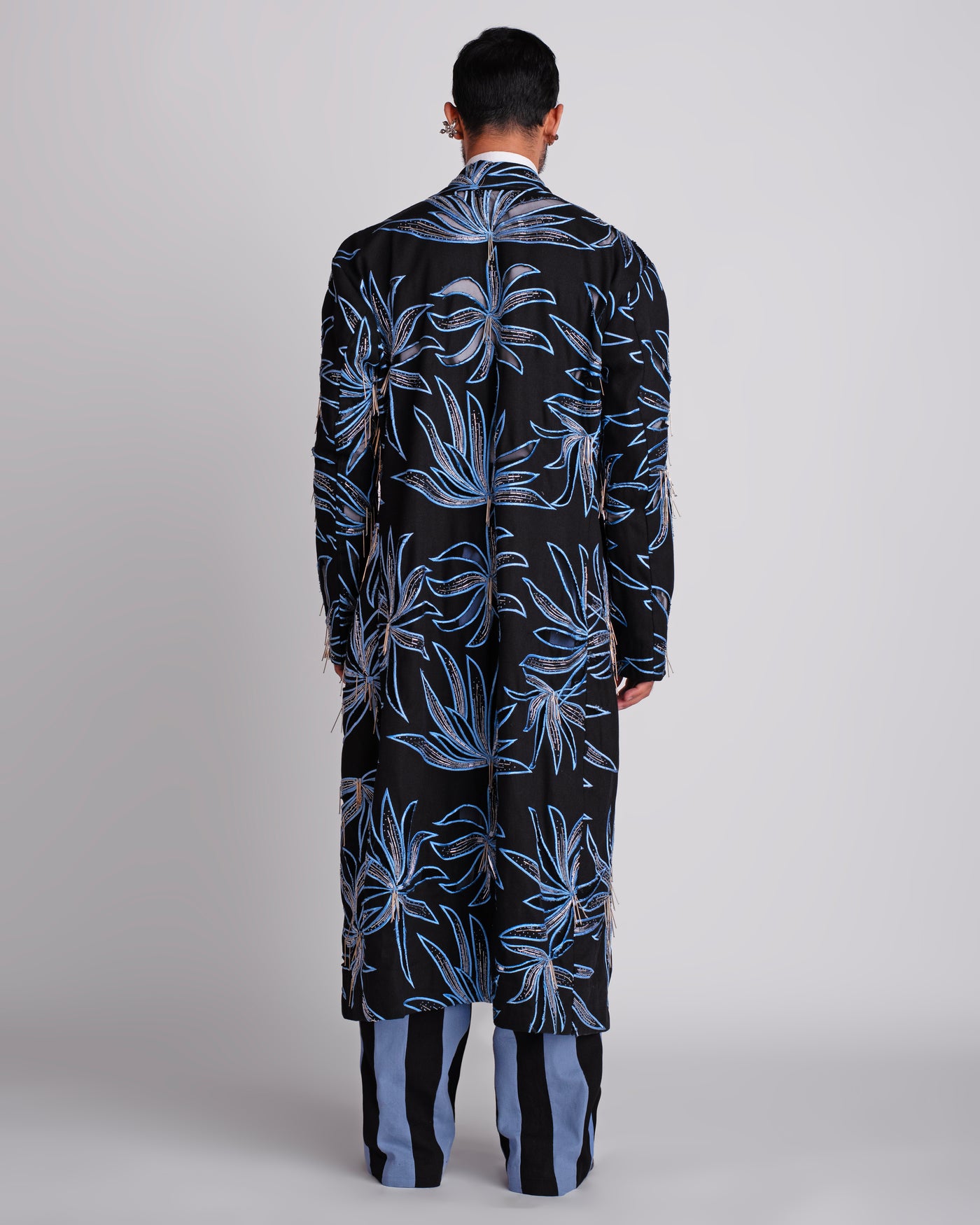 ROSANI The Noah coat in black. Back view showing full hand cutwork and thread embroidery surface. ANIMA and ANIMUS collection.