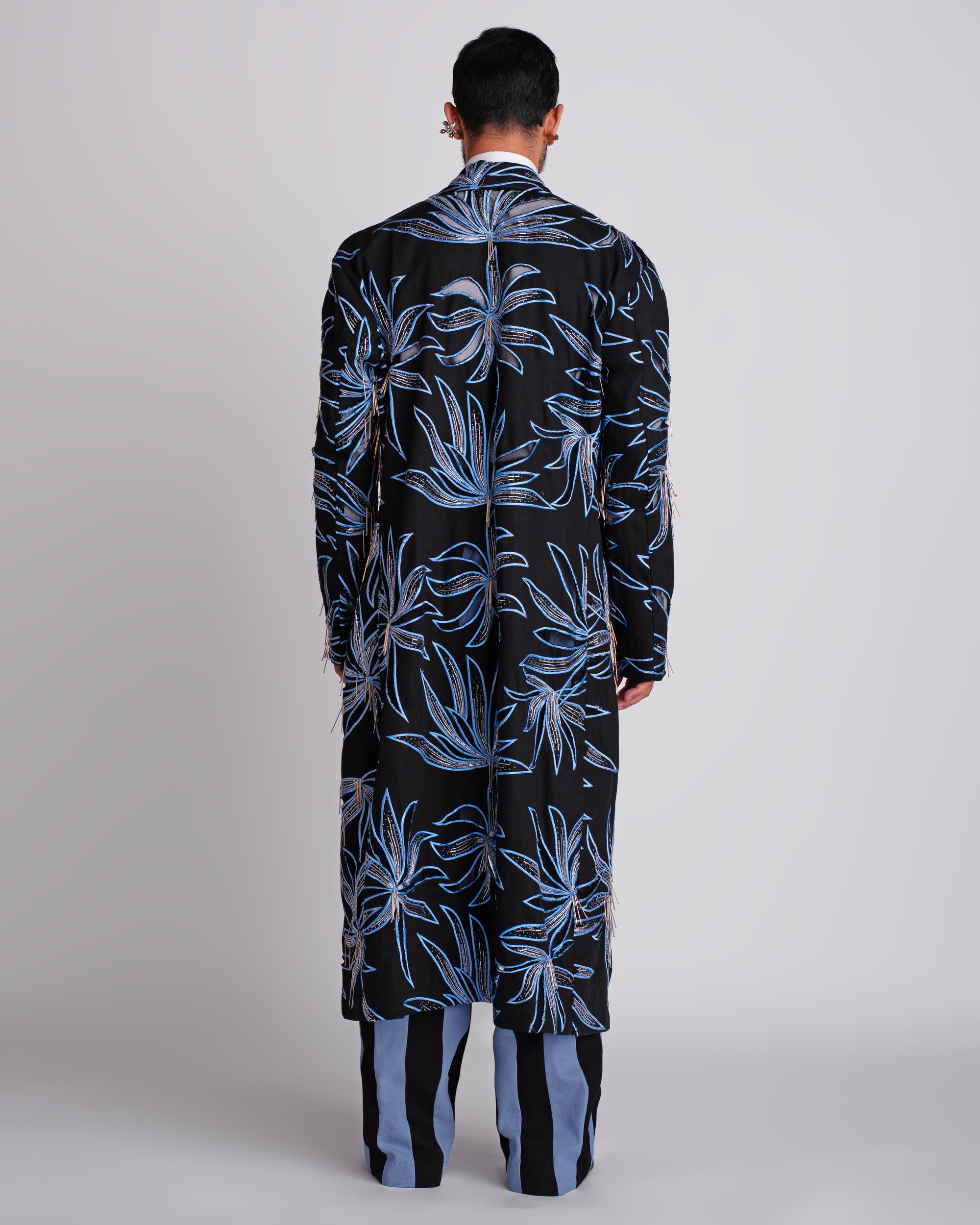 ROSANI The Noah coat in black. Back view showing full hand cutwork and thread embroidery surface. ANIMA and ANIMUS collection.