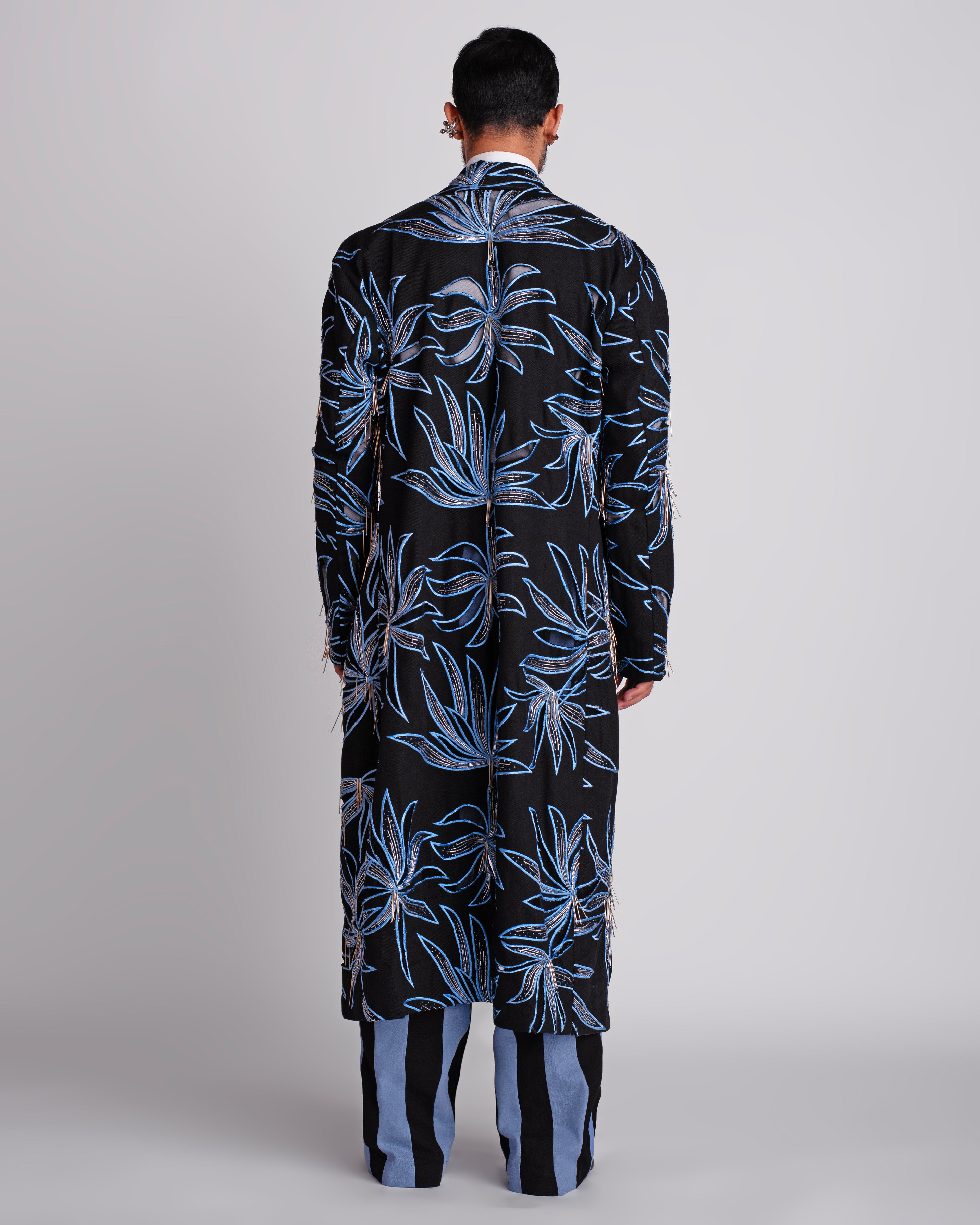 ROSANI The Noah coat in black. Back view showing full hand cutwork and thread embroidery surface. ANIMA and ANIMUS collection.