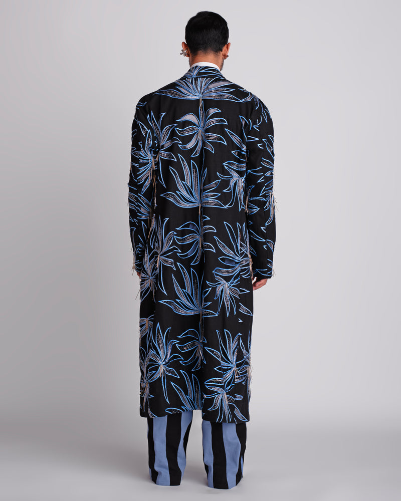 ROSANI The Noah coat in black - longline embellished evening coat with hand cutwork and blue thread embroidery, back view