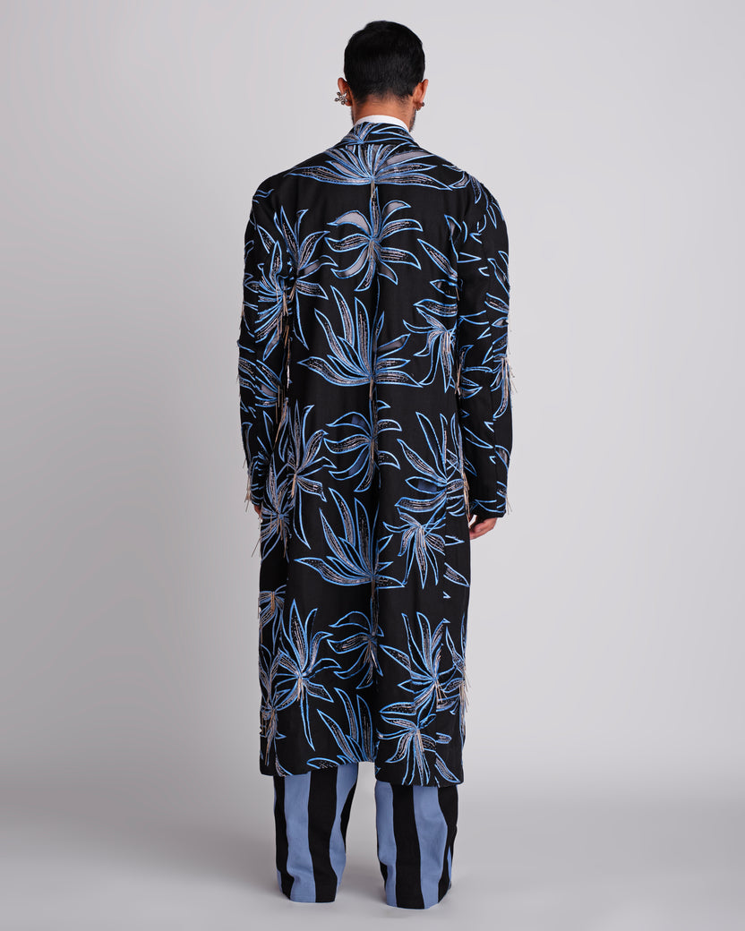ROSANI The Noah coat in black. Back view showing full hand cutwork and thread embroidery surface. ANIMA and ANIMUS collection.