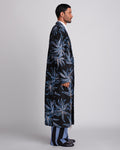 ROSANI The Noah coat in black. Side view showing tailored silhouette and embellishment movement.