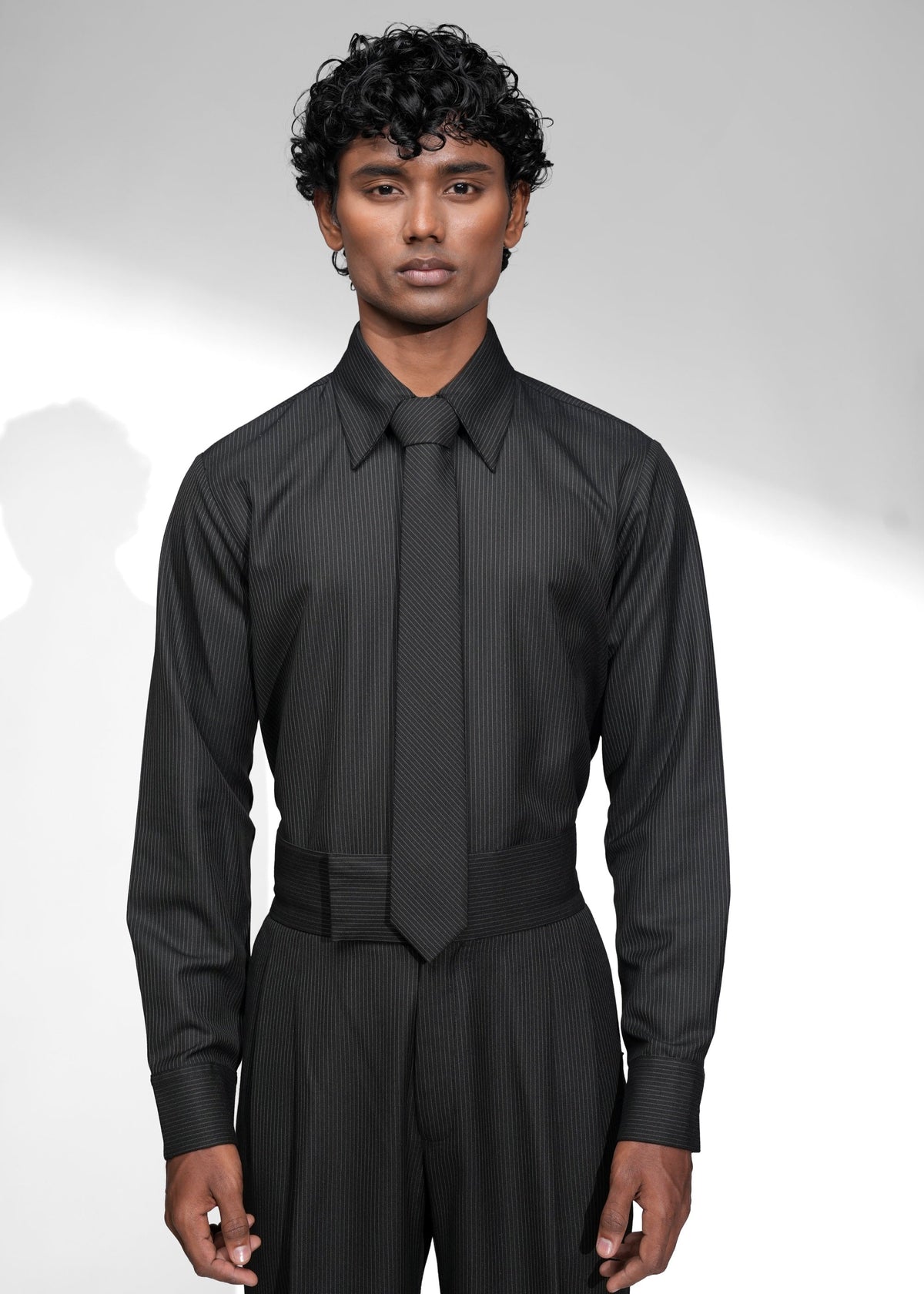 ROSANI Pinstripe tie in black - slim pinstripe tie, worn styling, front view
