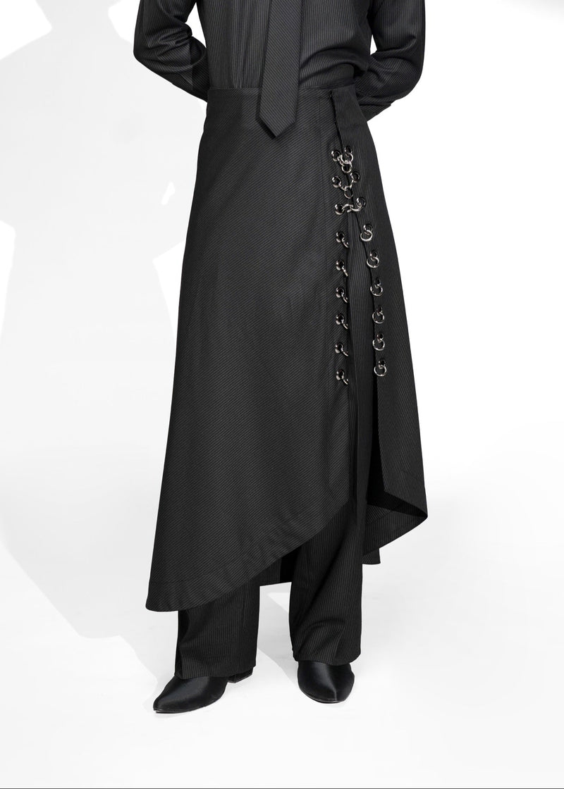 ROSANI The Sphere skirt in black - asymmetric draped maxi skirt with metal ring detail, front view