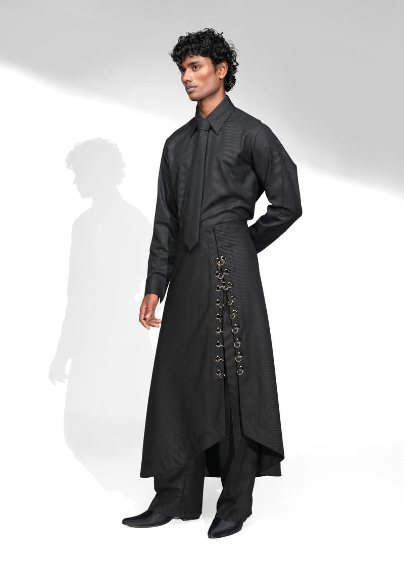 ROSANI The Sphere skirt in black - asymmetric draped maxi skirt with metal ring detail, side view