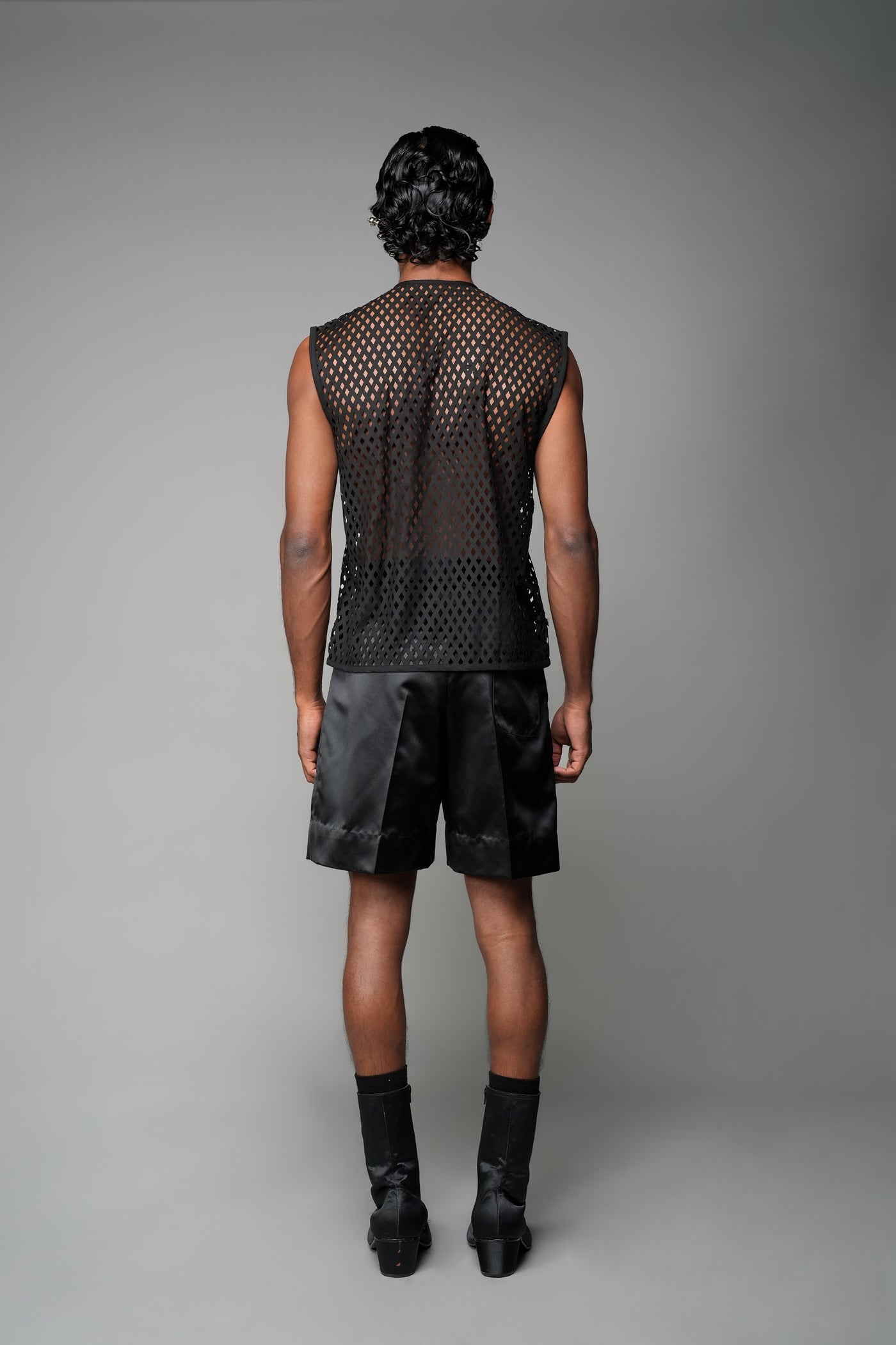 ROSANI The Void t-shirt in black - laser-cut suiting sleeveless vest, back view