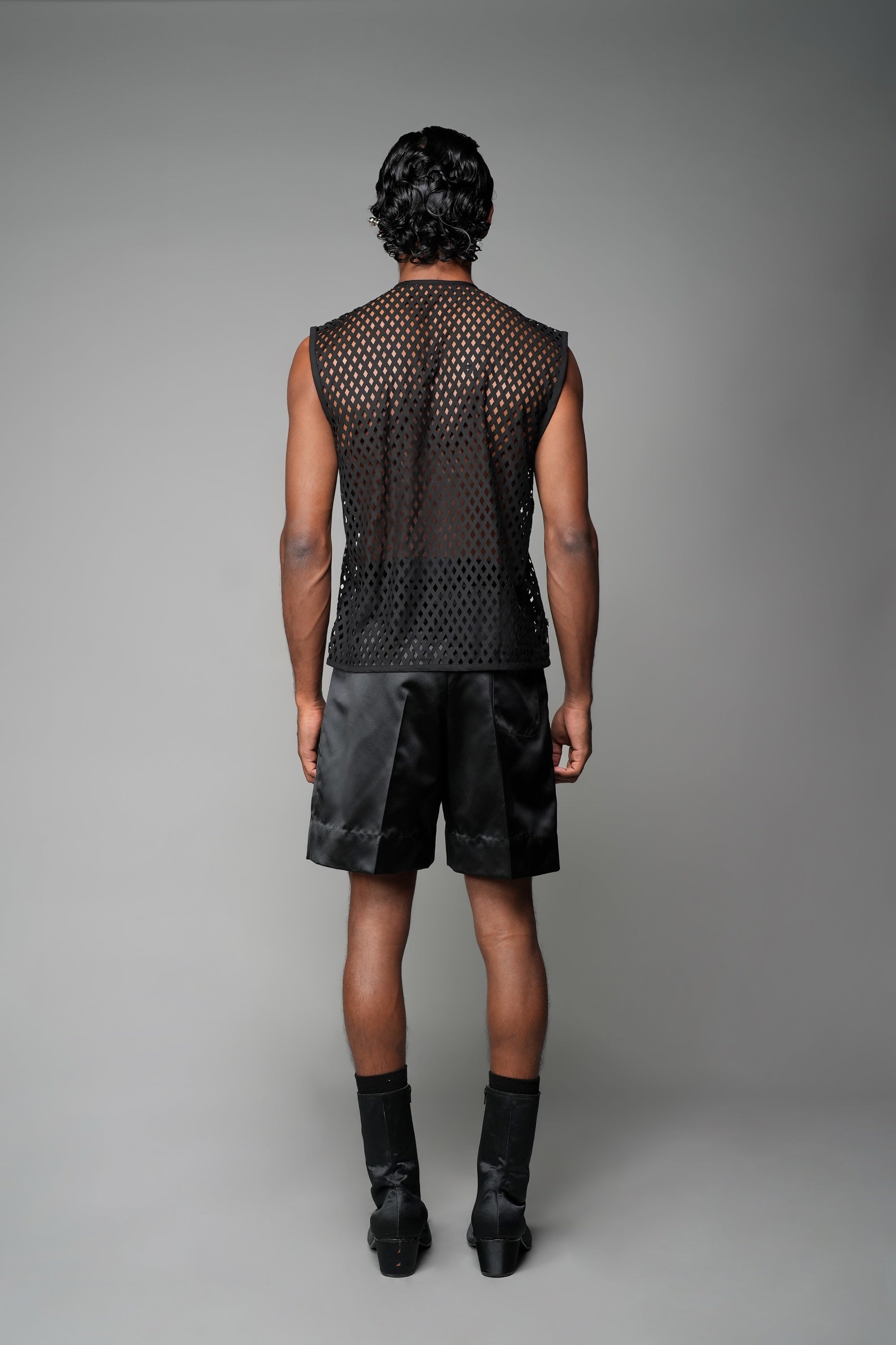 ROSANI The Void t-shirt in black - laser-cut suiting sleeveless vest, back view