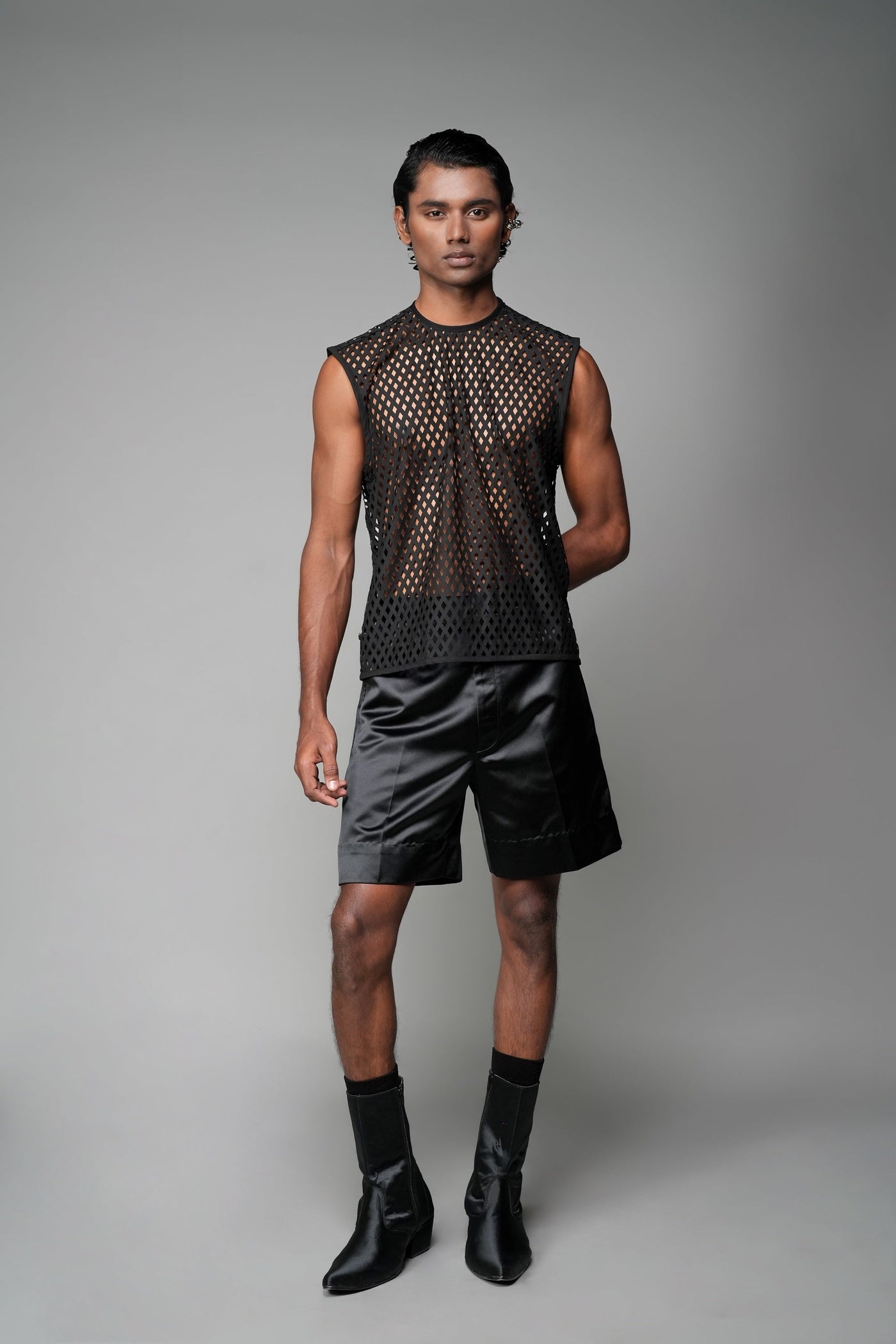 ROSANI The Void t-shirt in black - laser-cut suiting sleeveless vest, front view