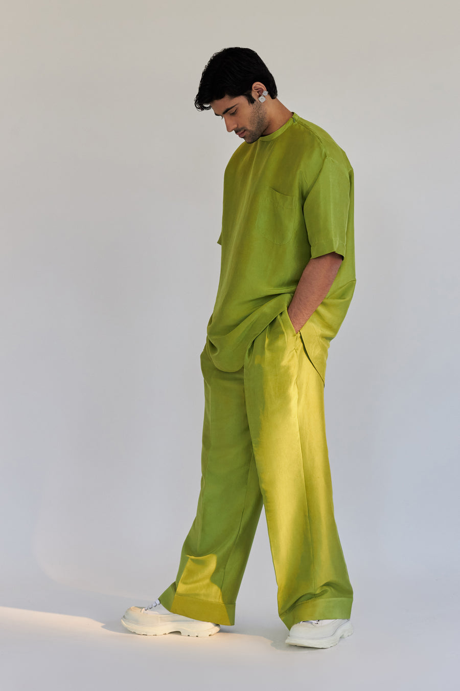 ROSANI The Anto t-shirt in chartreuse, three-quarter view showing silk drape and rounded hem.