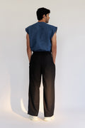 ROSANI The Ameo shirt in denim blue, back view showing curved hem construction.