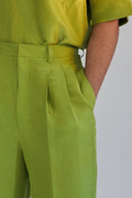 ROSANI The Theo trouser in chartreuse, second front view showing silk drape.