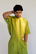 ROSANI The Anto t-shirt in chartreuse, front view. Pure silk with chest pocket and signature shoulder zip. DYMENSION collection.