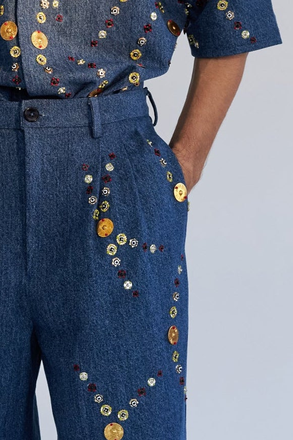 ROSANI The Enzo trouser, detail of hand-placed metallic disc embroidery on denim front.