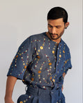 ROSANI The Atto shirt, front view. Boxy denim with all-over metallic disc and bead hand embroidery. DYMENSION collection.